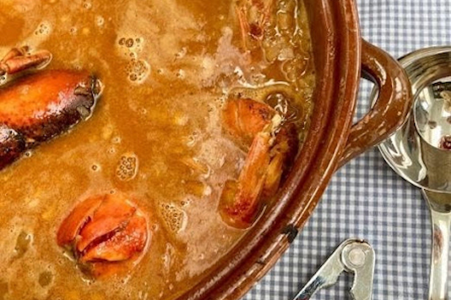 Arros caldos amb llagosta i gamba vermella